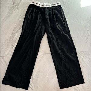 Black fold over trousers